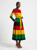 "Accra" Long Sleeve Midaxi Dress — three-quarter view on model, hand in the side pocket