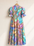 "Almasi" Puff Sleeve Dress — the dress on a hanger, back
