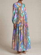 "Almasi" Puff Sleeve Maxi Dress — three-quarter view on model