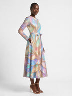 "Almasi" Long Sleeve Midaxi Dress — three-quarter view on model, hand in the side pocket