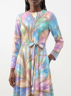 "Almasi" Long Sleeve Midaxi Dress — close-up of the tie sash and the in-seam side pocket