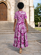 "Anasa" Short Sleeve Maxi Dress — back view on model in the churchyard