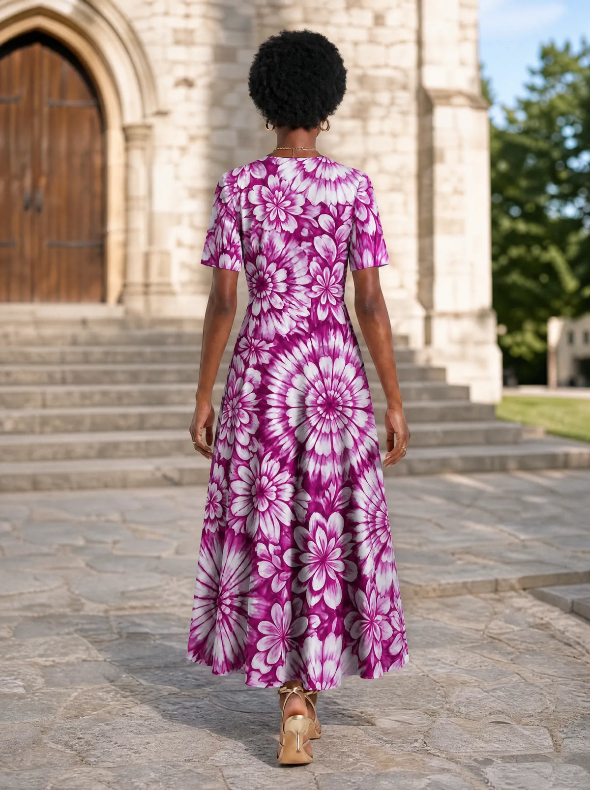 "Anasa" Short Sleeve Maxi Dress — back view on model in the churchyard