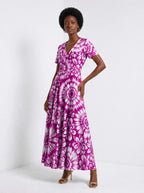 "Anasa" Short Sleeve Maxi Dress — walking, three-quarter view on model