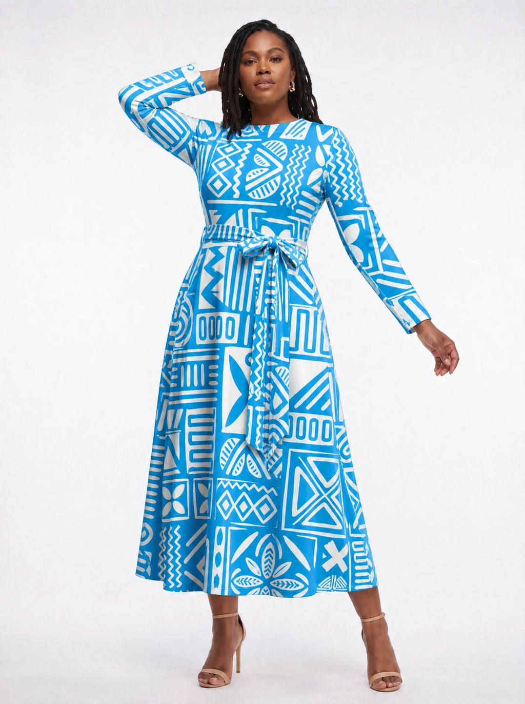 "Anga" Long Sleeve Midaxi Dress — three-quarter view on model, hand in the side pocket