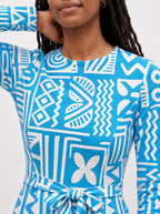 "Anga" Long Sleeve Midaxi Dress — close-up of the round neckline and long sleeve