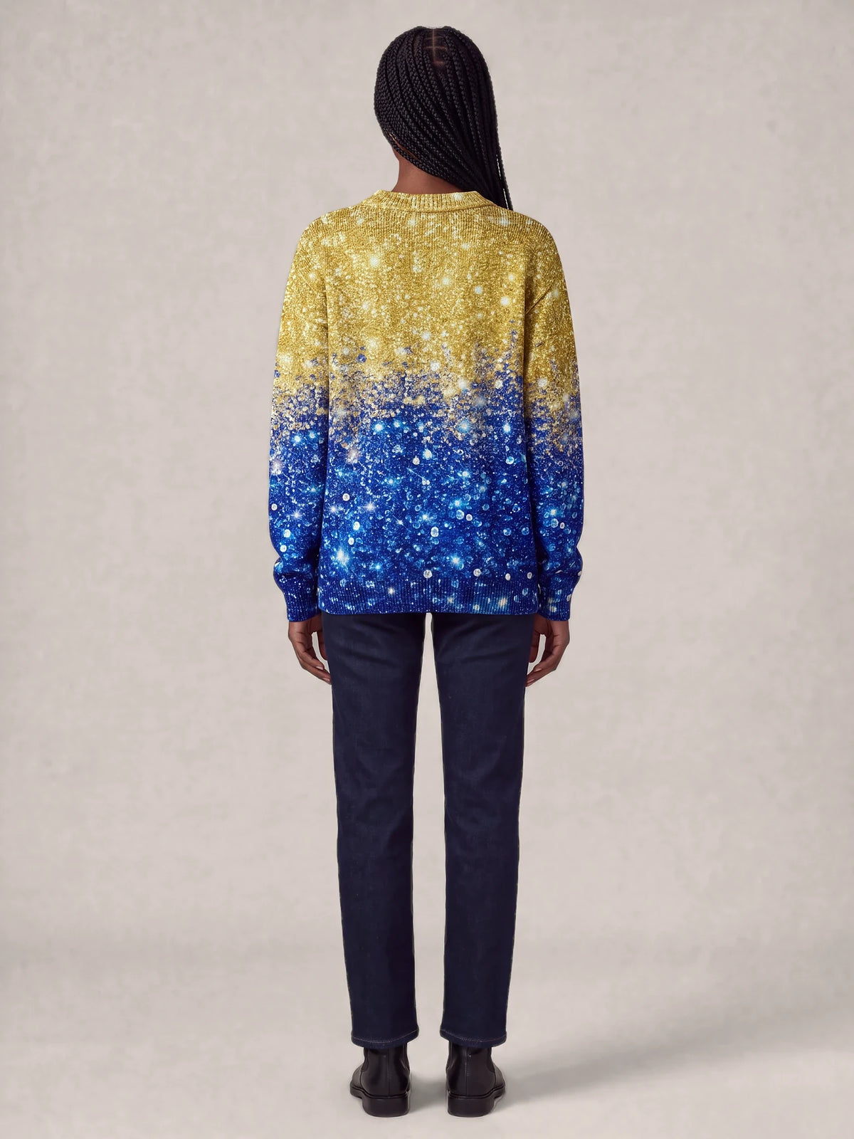 "Angaza" Sweatshirt — back view on model