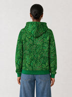 "Asili" Emerald Hoodie — back view on model
