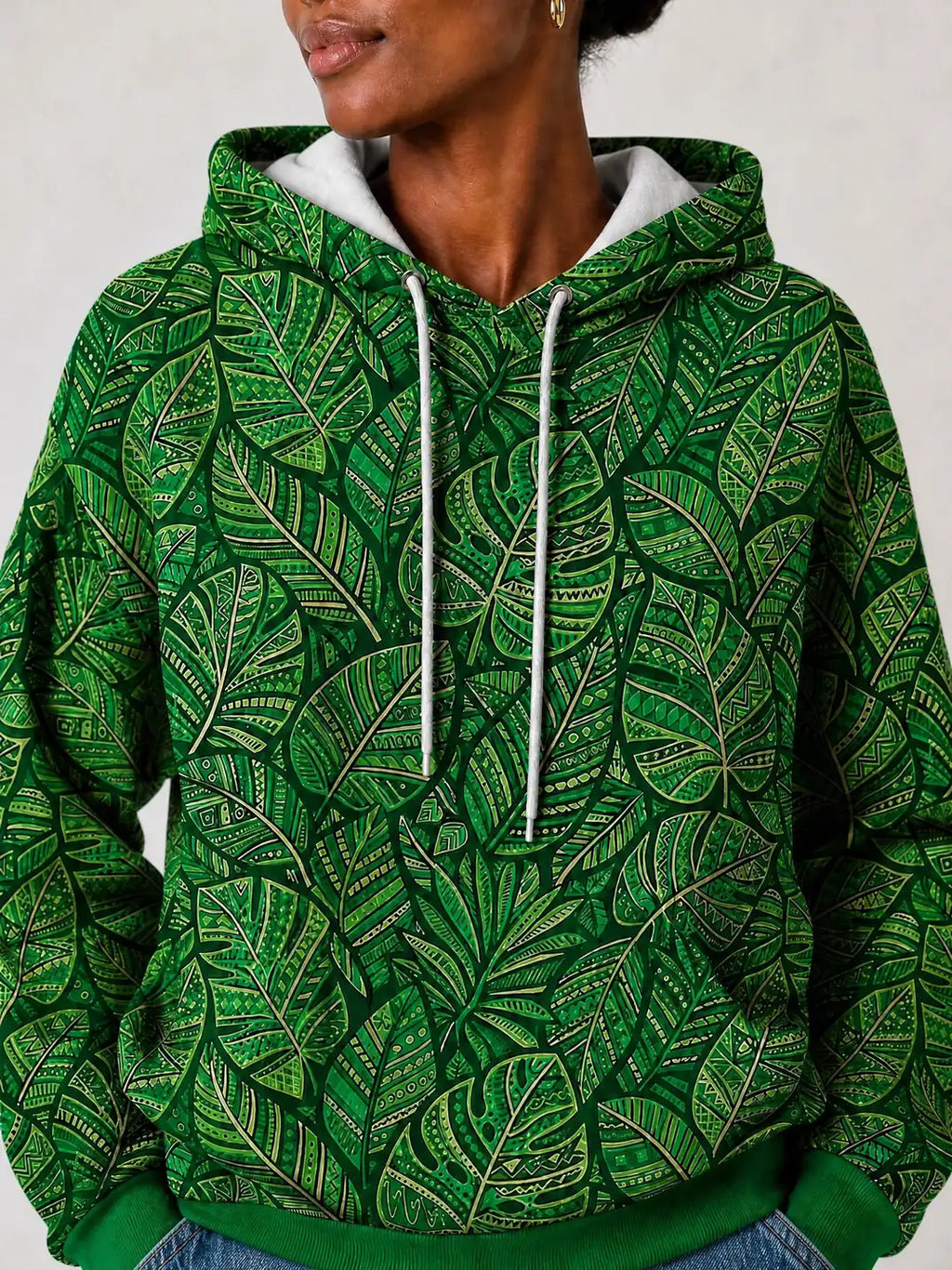 "Asili" Emerald Hoodie — close-up on model