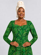 "Asili Emerald" Long Sleeve Sweetheart Midi Dress — print close-up on model
