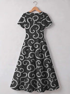 "Duara" V Neck Midi Dress