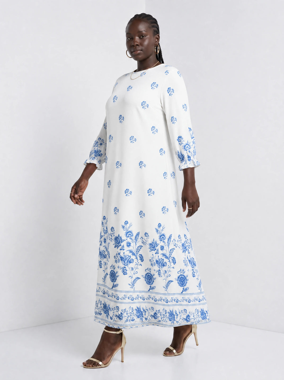 "Buluu" Long Sleeve Maxi Dress — three-quarter view on model