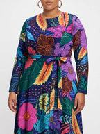 "Bustani" Long Sleeve Midaxi Dress — close-up of the tie sash and the in-seam side pocket
