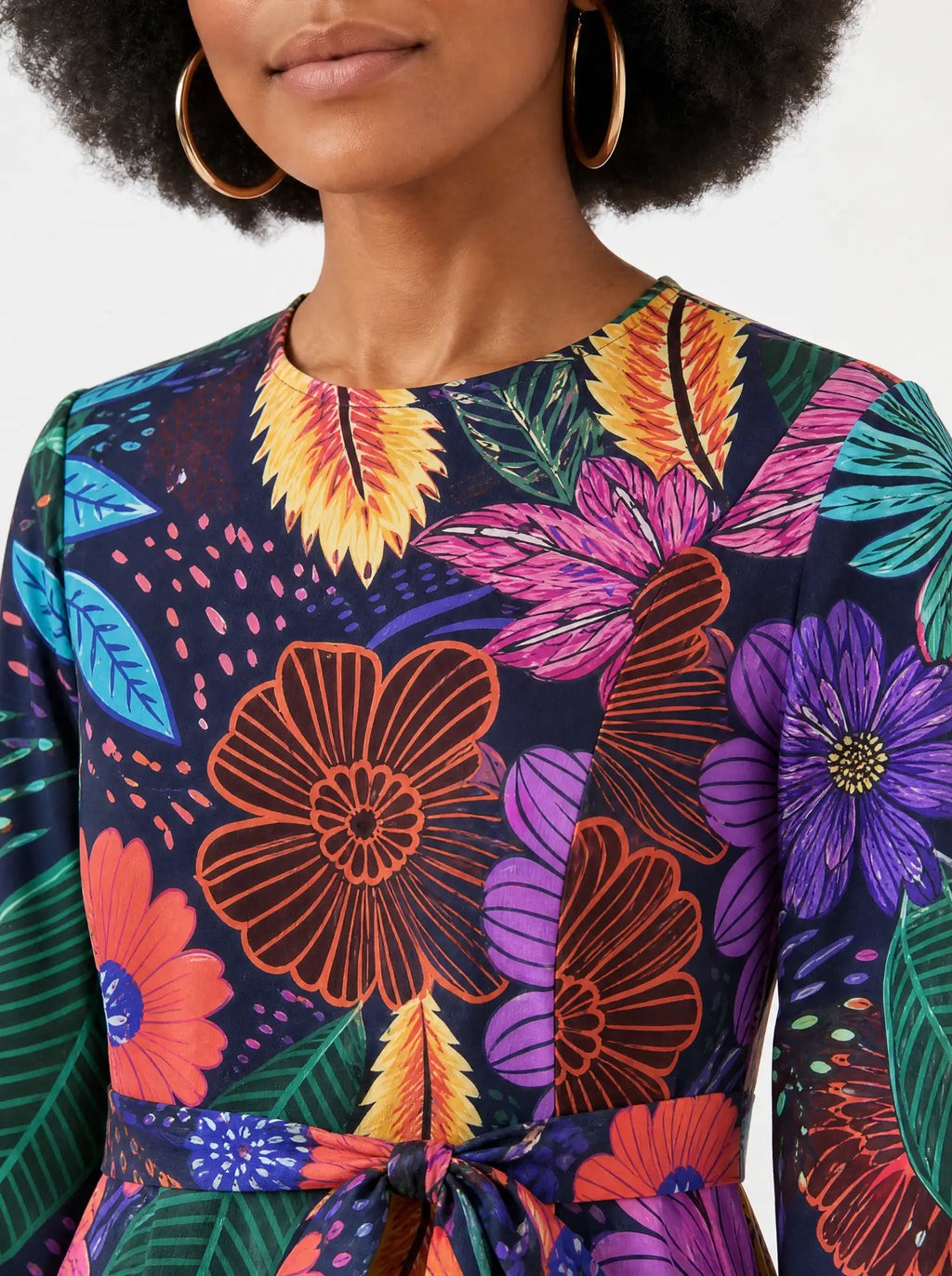 "Bustani" Long Sleeve Midaxi Dress — close-up of the round neckline and long sleeve
