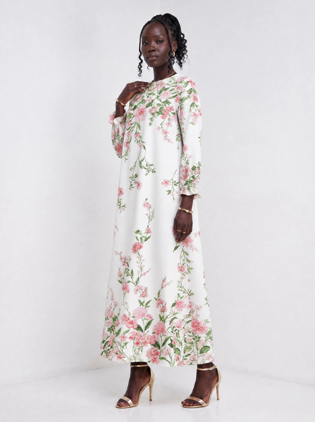 "Chanua" Long Sleeve Maxi Dress — three-quarter view on model