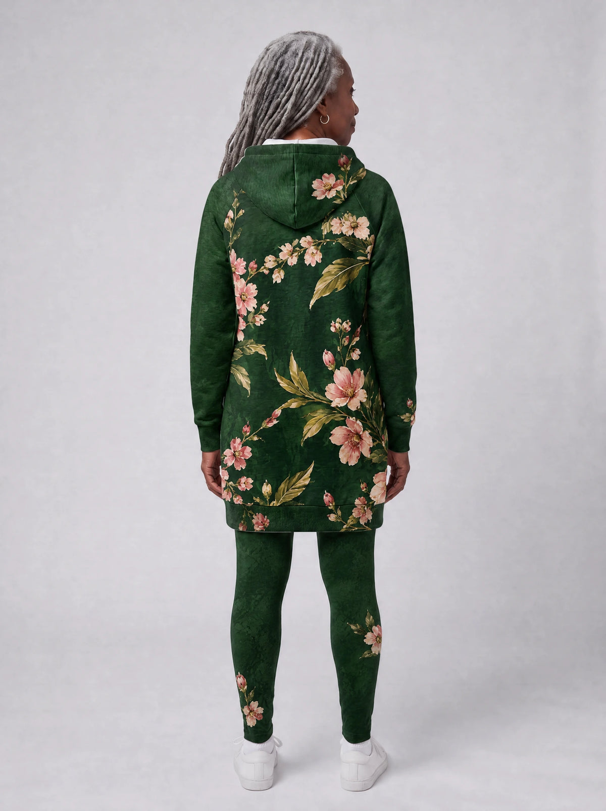 "Chipukizi" Hoodie Dress — back view on model, styled with the matching leggings