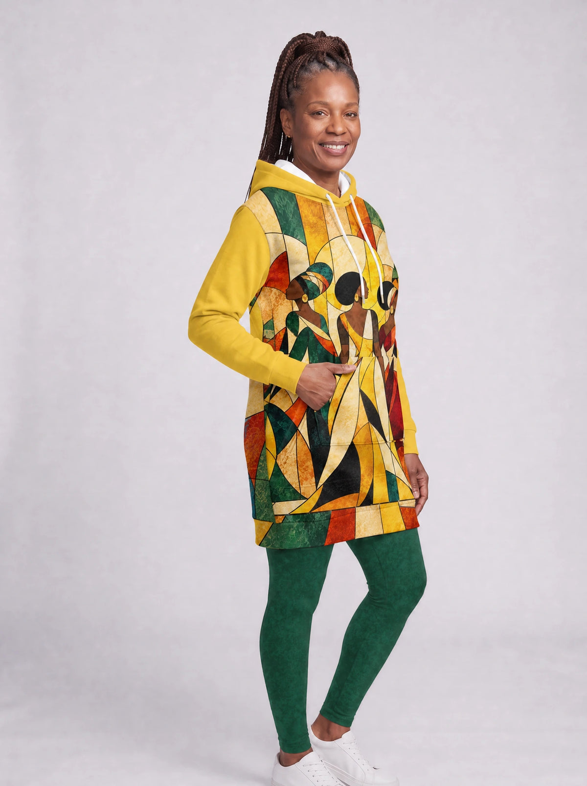 "Dada" Hoodie Dress — three-quarter view on model, hand in pocket, styled with the matching leggings