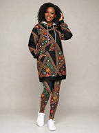 "Darizi" Hoodie Dress — front view on model, hand in pocket, styled with the matching leggings