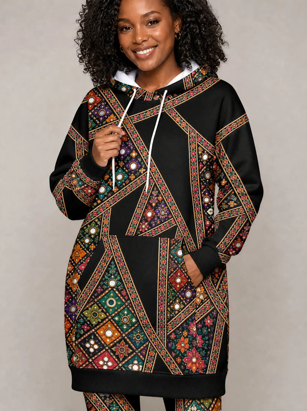 "Darizi" Hoodie Dress — close-up on model, hand in pocket