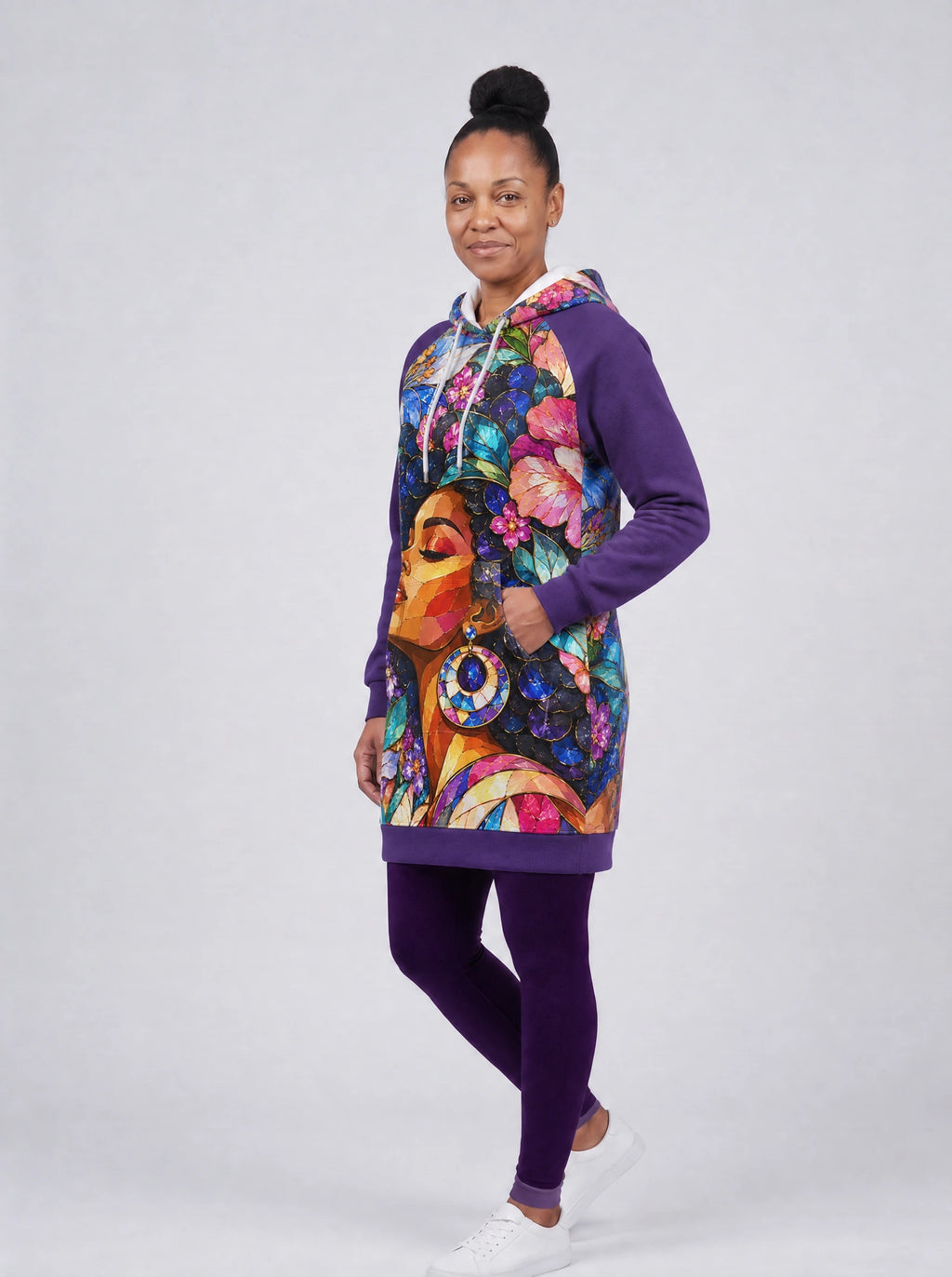 "Dirisha" Hoodie Dress — three-quarter view on model, hand in pocket, styled with the matching leggings