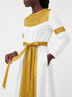 "Egyptian Goddess" Long Sleeve Midaxi Dress — standing, angled view on model