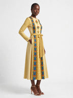 "Egyptian Queen" Long Sleeve Midaxi Dress — walking, three-quarter view on model