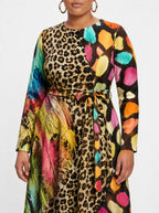 "Fahari" Long Sleeve Midaxi Dress — close-up of the tie sash and the in-seam side pocket
