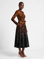 "Fuvu" Halloween Long Sleeve Midaxi Dress — three-quarter view on model, hand in the side pocket