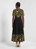 "Giza" Short Sleeve Maxi Dress — back view on model