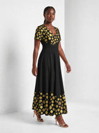 "Giza" Short Sleeve Maxi Dress — walking, three-quarter view on model
