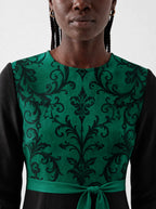 "Green Witch" Long Sleeve Midaxi Dress — three-quarter view on model