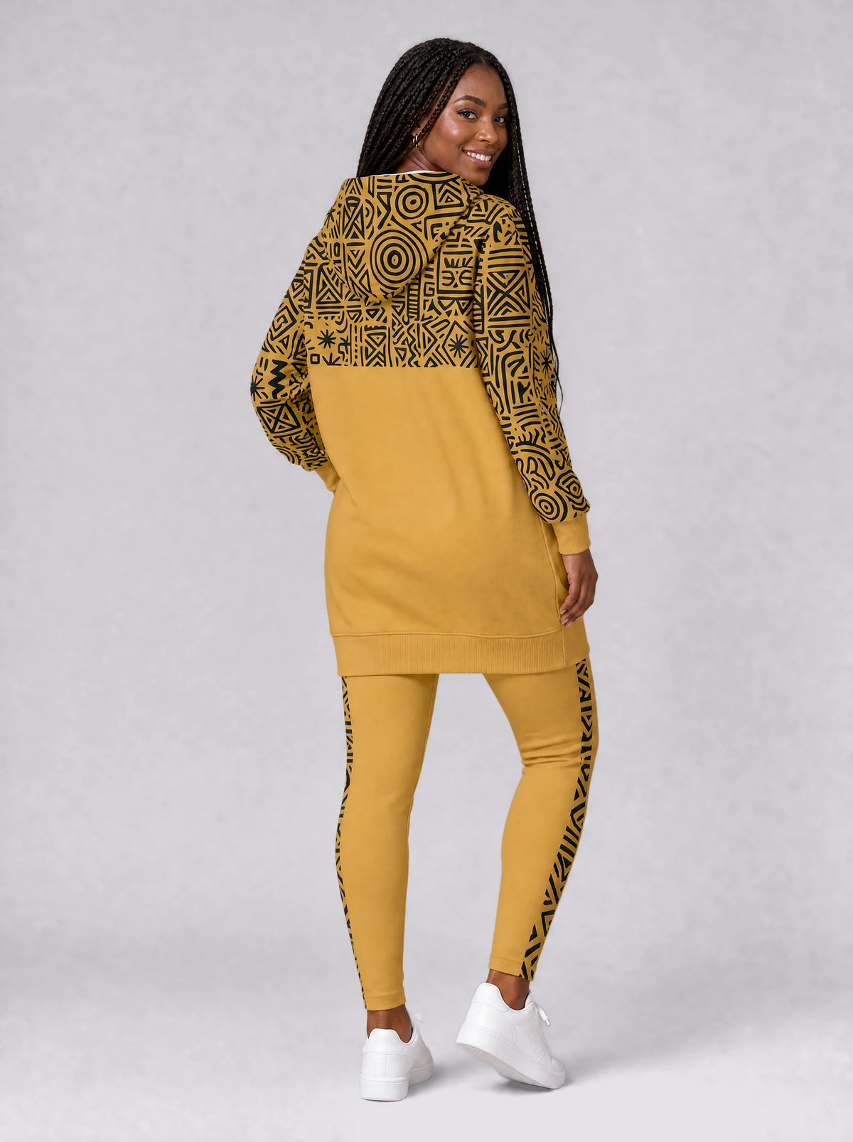 "Haradali" Leggings — back view on model, styled with the matching hoodie dress