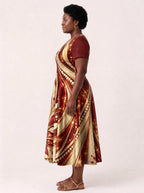 "Hariri" V Neck Midi Dress — side view on model