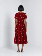 "Heko" Sweetheart Midi Dress — back view on model