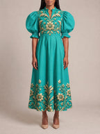 "Heshima" Puff Sleeve Dress — three-quarter view on model