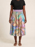 "Almasi" Twirl Skirt — cropped front view on model