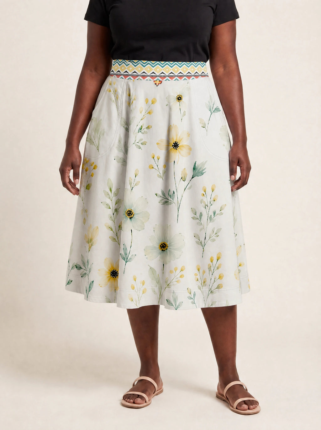"Alizeti" Twirl Skirt — cropped front view on model