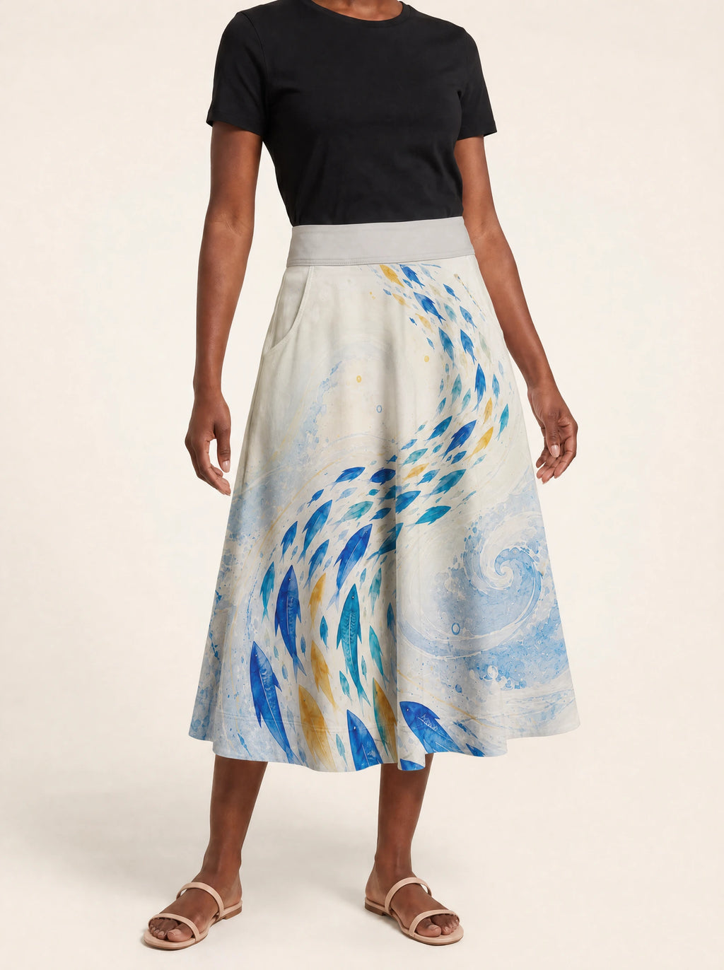 "Samaki" Twirl Skirt — cropped front view on model