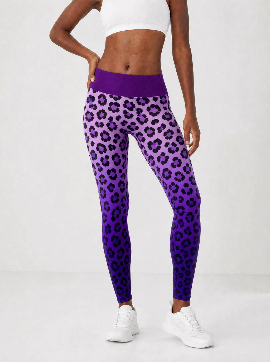 "Unstoppable" Amethyst Leopard Leggings — front view on model