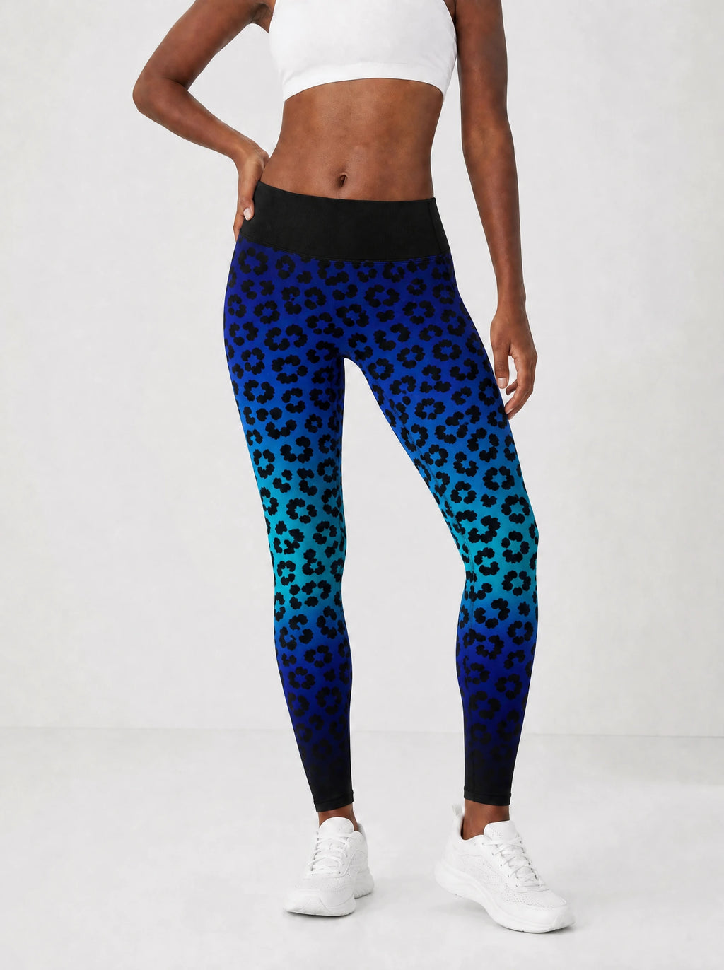 "Unstoppable" Sapphire Leopard Leggings — front view on model