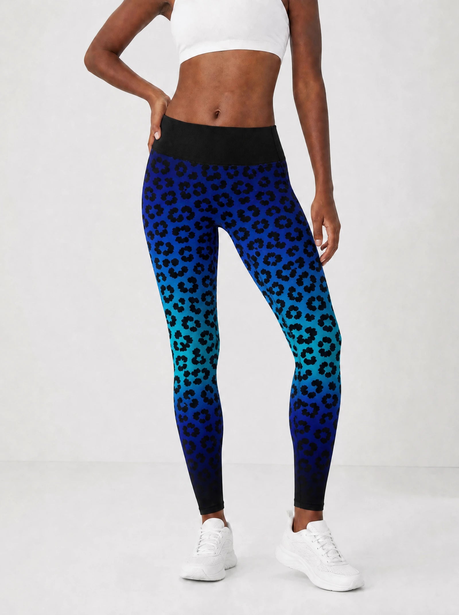 "Unstoppable" Sapphire Leopard Leggings — front view on model