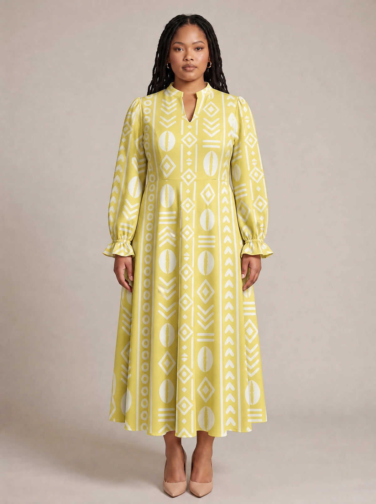 "Oshun Dhahabu" Long Puff Sleeve Dress — front view on model