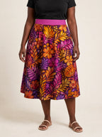 "Waridi" Twirl Skirt — cropped front view on model