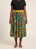 "Taji" Twirl Skirt — cropped front view on model