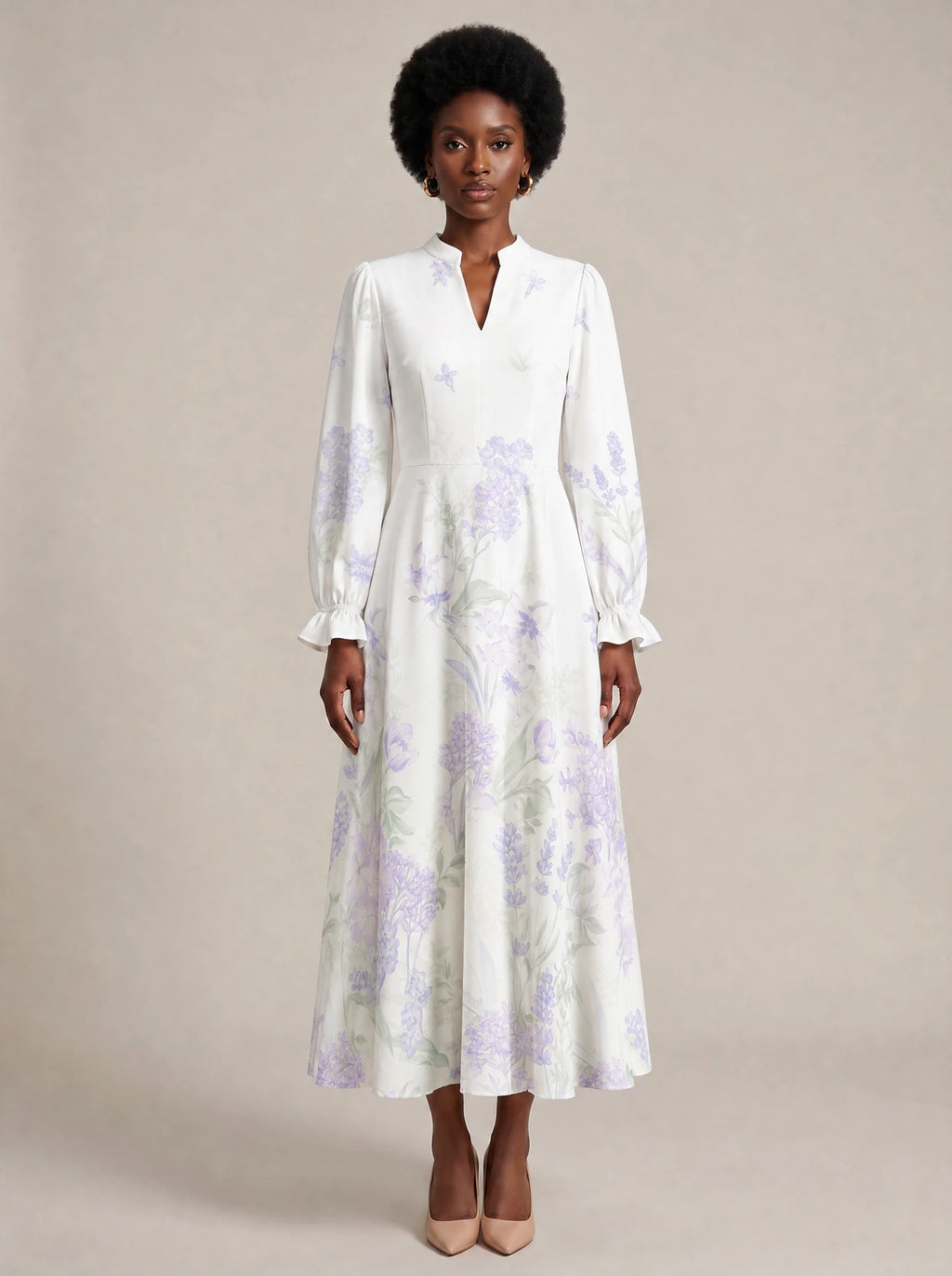 "Urujuani" Long Puff Sleeve Dress — front view on model