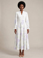 "Urujuani" Long Puff Sleeve Dress — front view on model