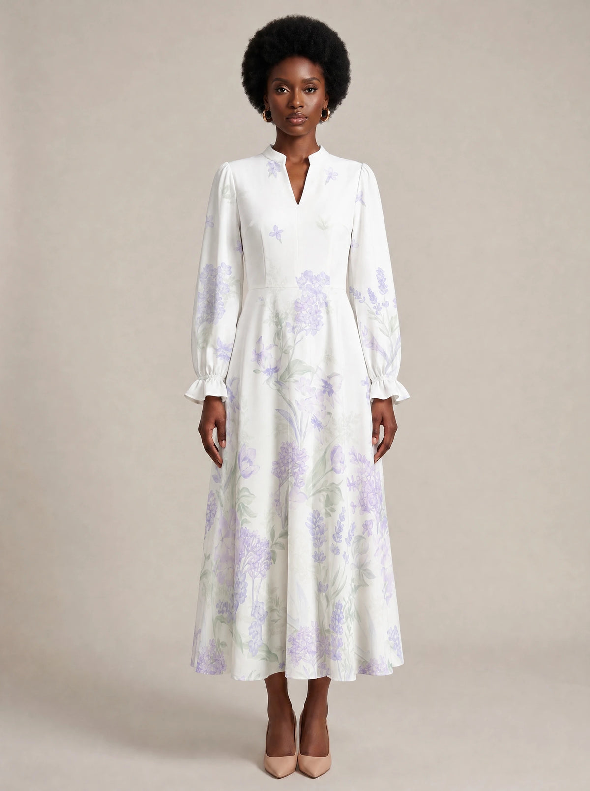 "Urujuani" Long Puff Sleeve Dress — front view on model