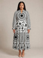 "Mwanga" Long Puff Sleeve Dress — front view on model