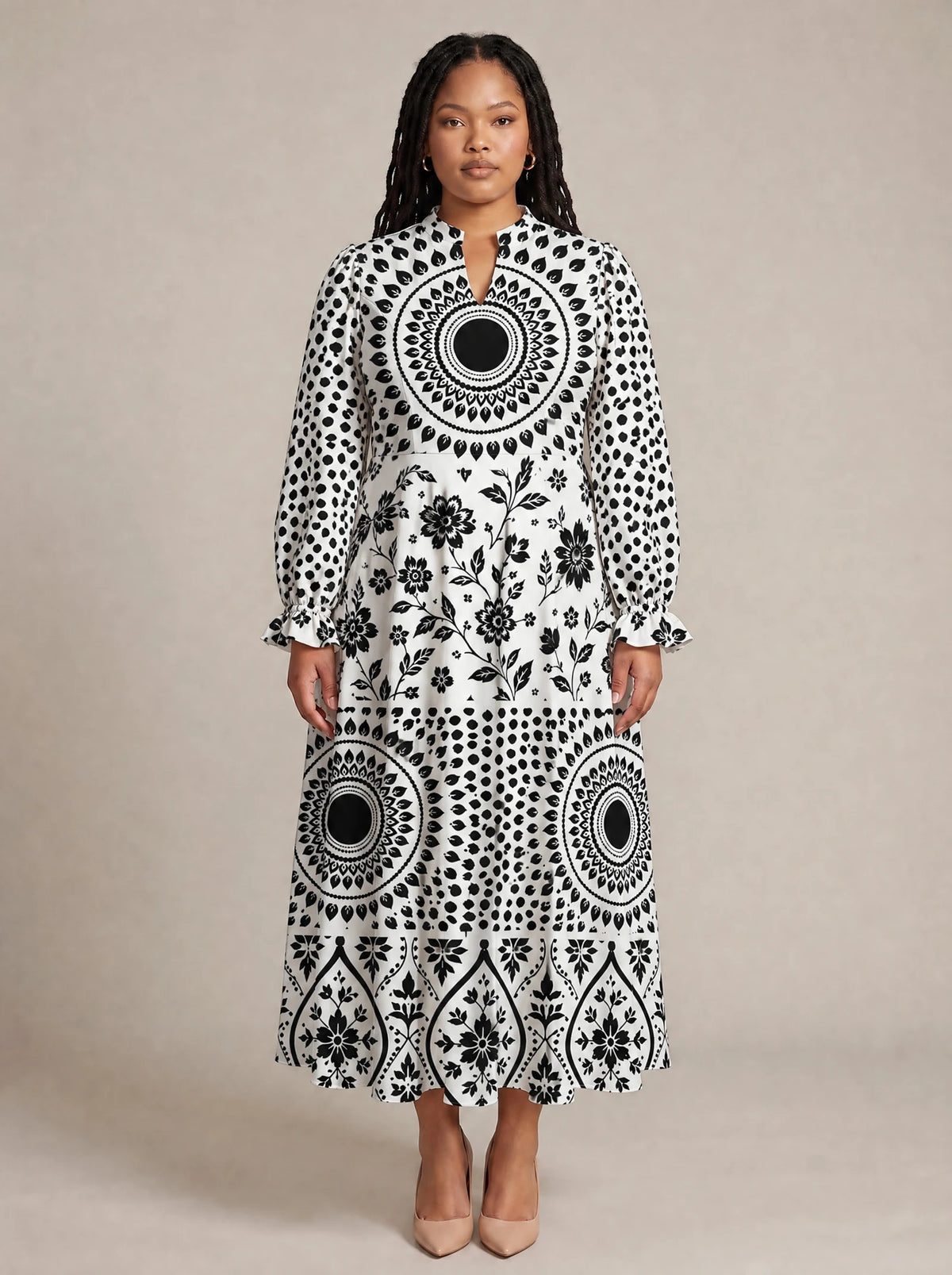 "Mwanga" Long Puff Sleeve Dress — front view on model