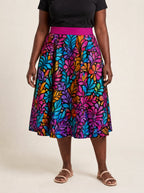 "Rangi" Twirl Skirt — cropped front view on model